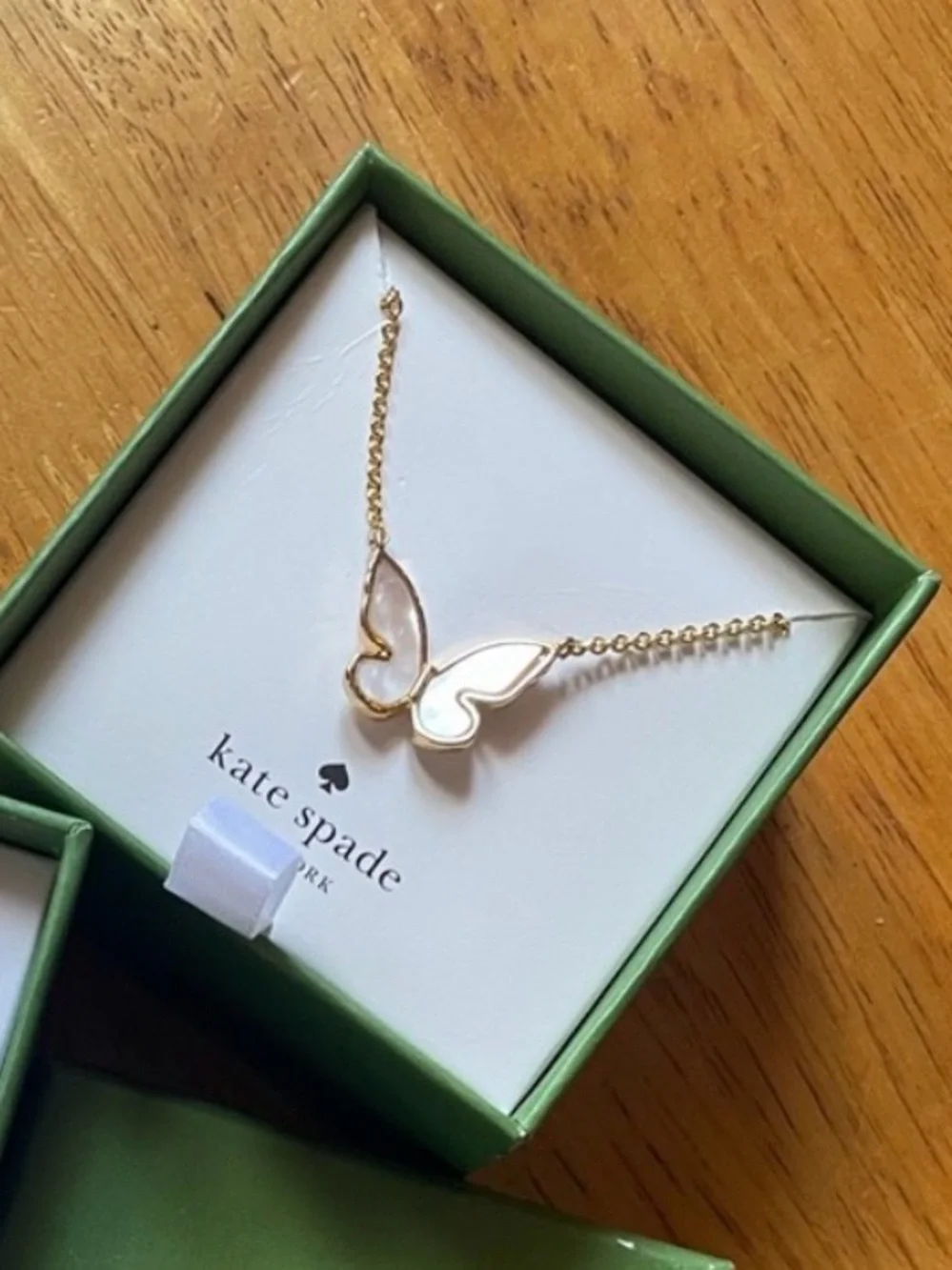 kate spade Gold Butterfly Pendant Necklace with White Enamel